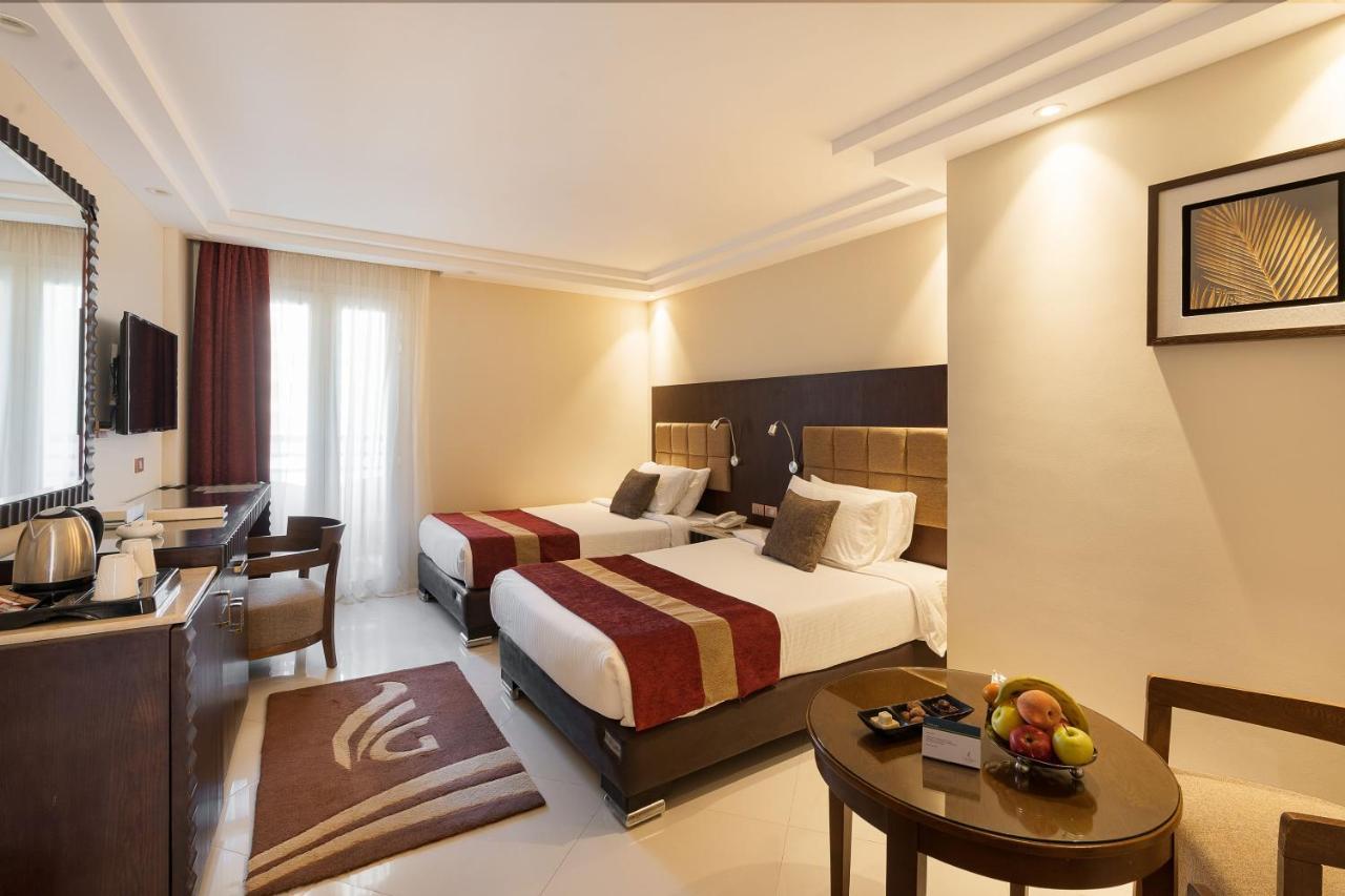 Отель Grand Ocean El Sokhna Айн-Сохна Экстерьер фото A room at the hotel