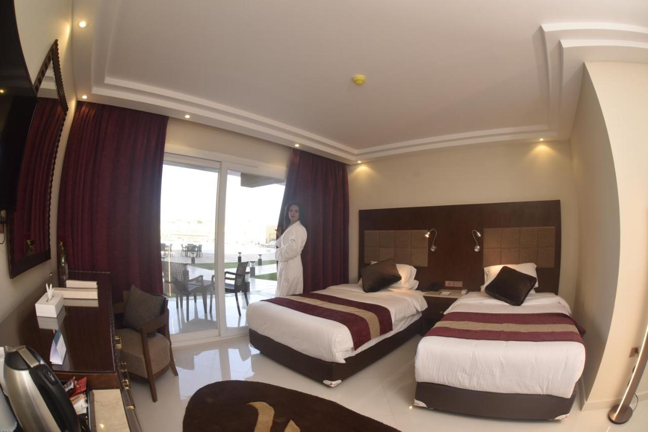 Отель Grand Ocean El Sokhna Айн-Сохна Экстерьер фото A room at the hotel